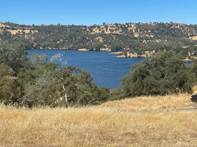 a view of yard covered with snow