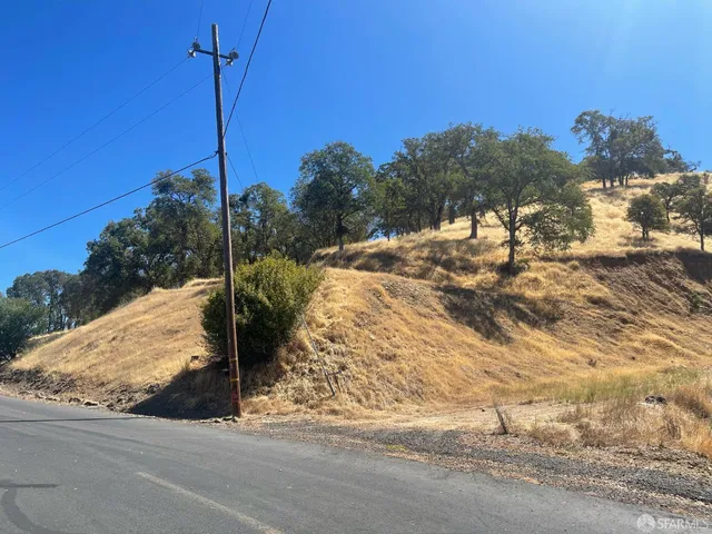 a street sign on a road next to road