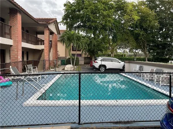 a view of a terrace with chairs