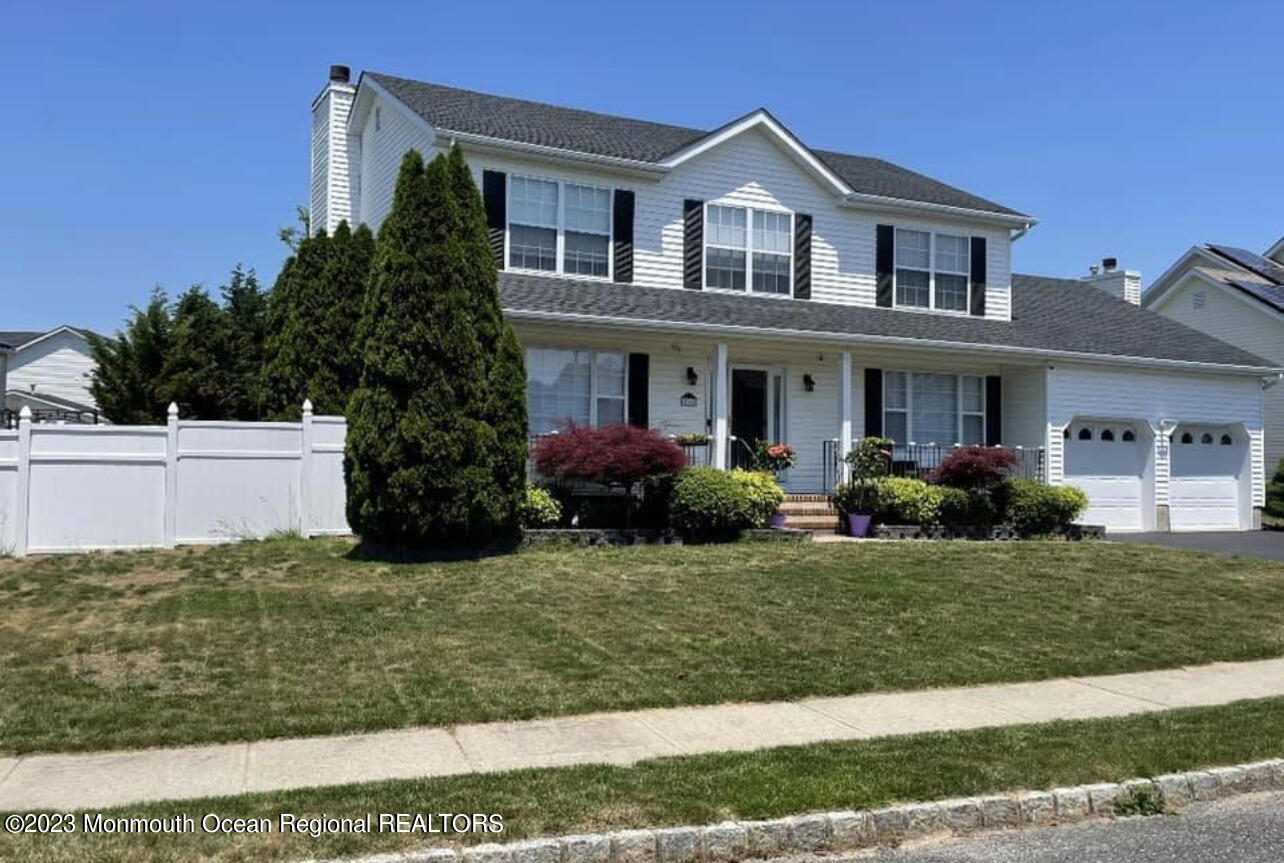 16 William Drive Howell, NJ 07731 - Photo 1 of 25 a front view of a house with a yard