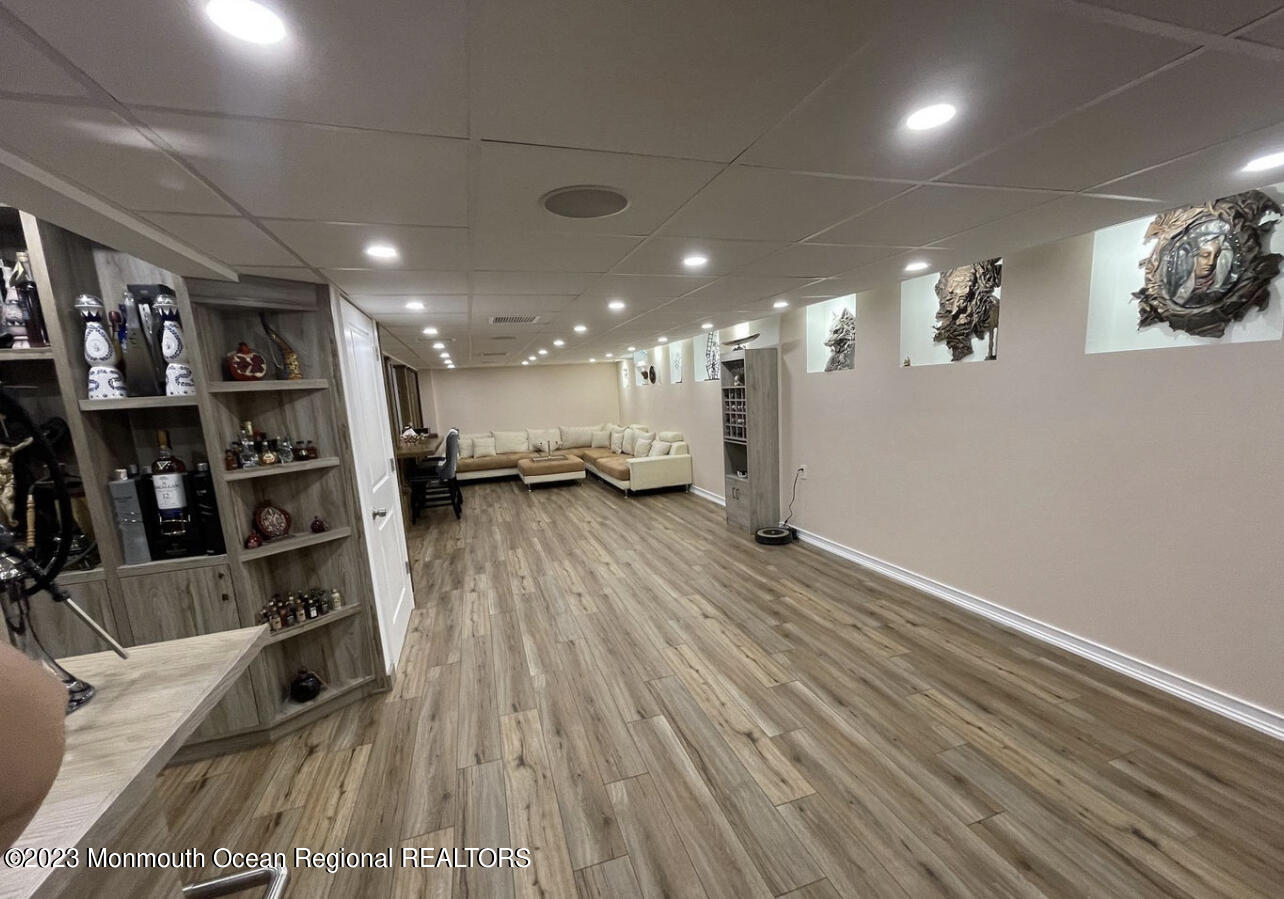 16 William Drive Howell, NJ 07731 - Photo 22 of 25 a view of a room with furniture and wooden floor