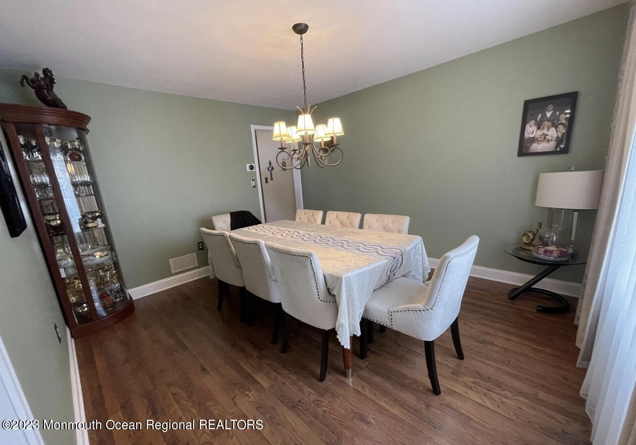 16 William Drive Howell, NJ 07731 - Photo 8 of 25 a dining room with furniture and wooden floor