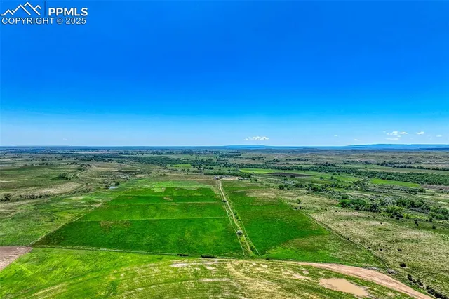 a view of a lake with a building in the background