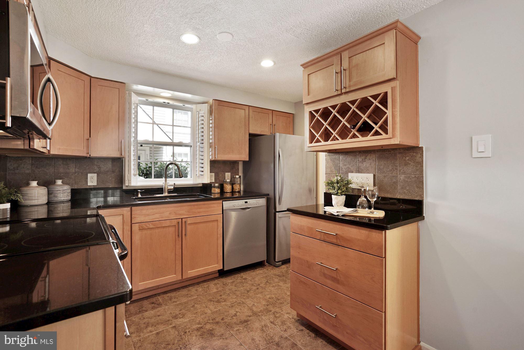 132 East Glebe Road Alexandria, VA 22305 - Photo 9 of 32 Kitchen with stainless steel appliances & granite