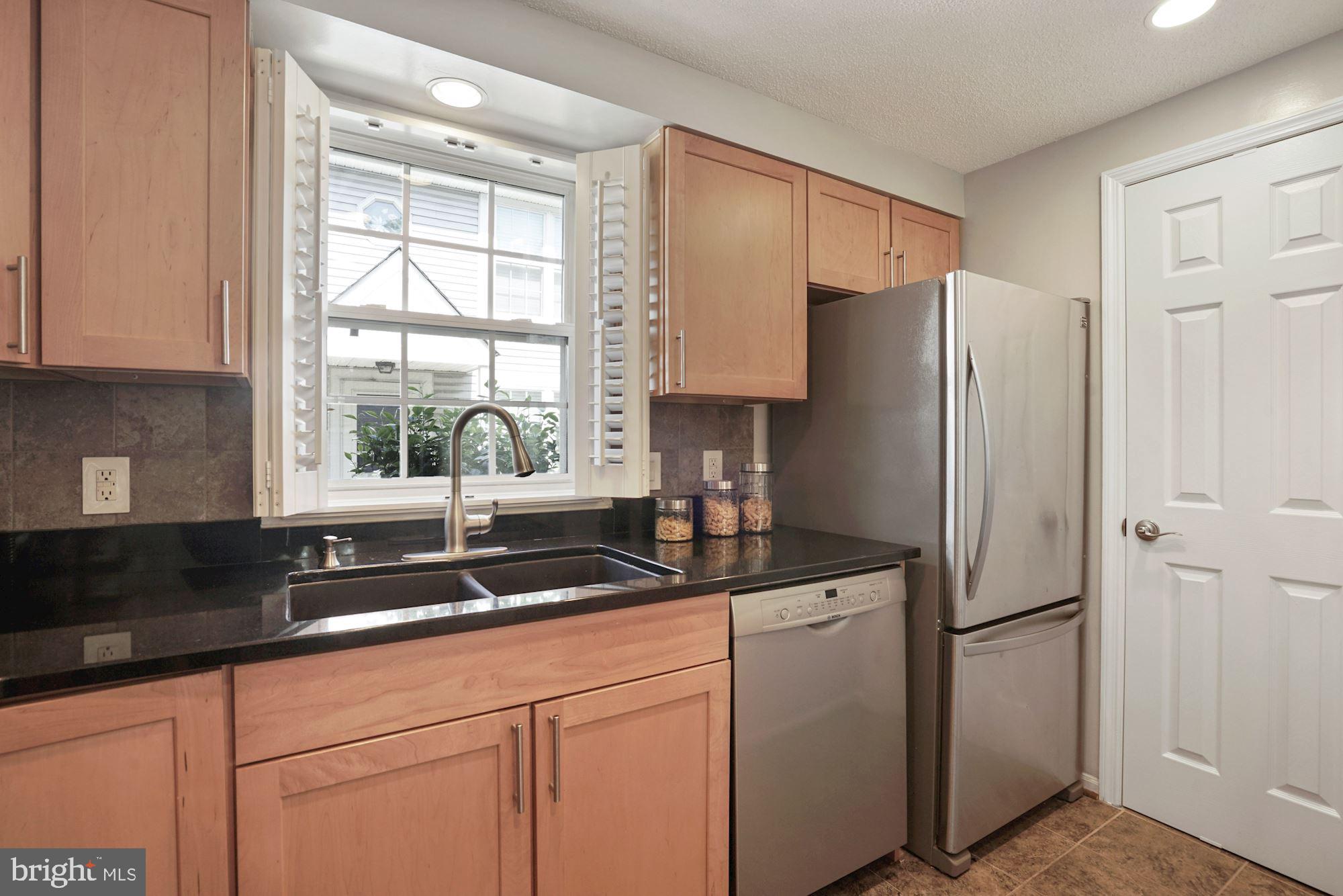 132 East Glebe Road Alexandria, VA 22305 - Photo 10 of 32 Kitchen with stainless steel appliances & granite
