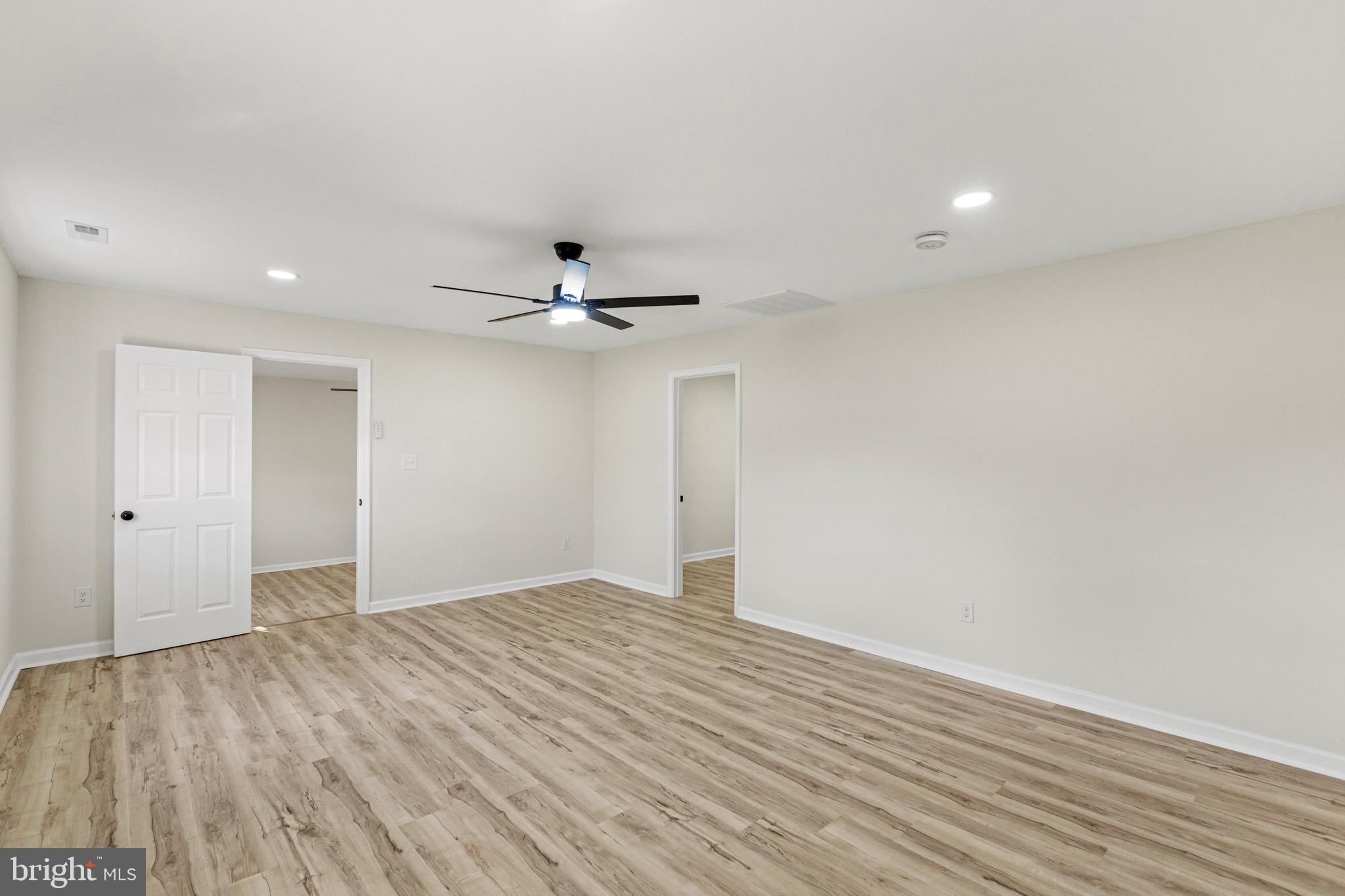 7764 Port Tobacco Road Port Tobacco, MD 20677 - Photo 6 of 14 a view of an empty room with wooden floor