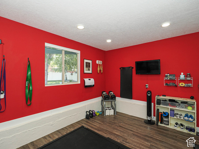 3308 Willow Ridge Road Salt Lake City, UT 84121 - Photo 54 of 59 Room featuring wood-finish flooring, recessed lighting, and a window with white trim