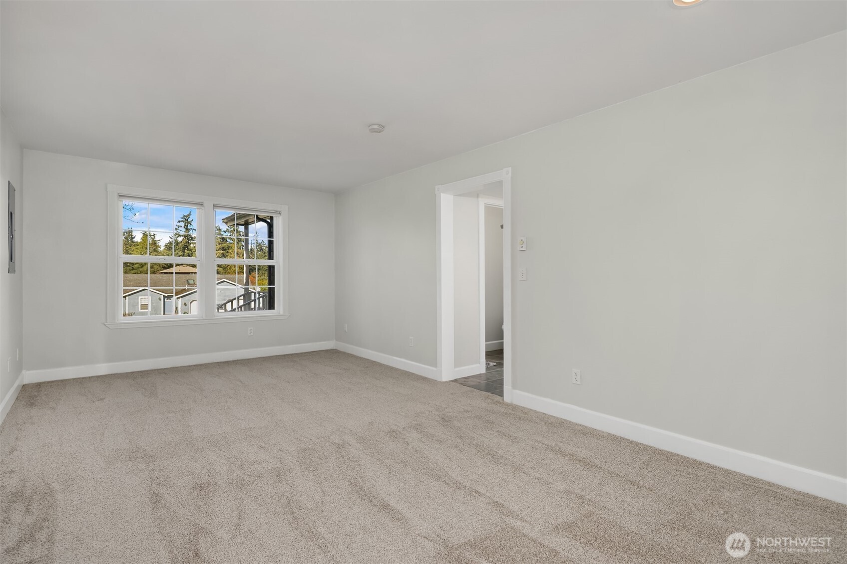 1316 East Backswing Lane Freeland, WA 98249 - Photo 18 of 34 an empty room with windows