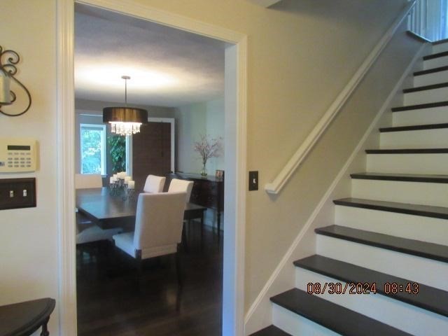 60 Raymond Road Sudbury, MA 01776 - Photo 12 of 21 a view of entryway and hall with wooden floor