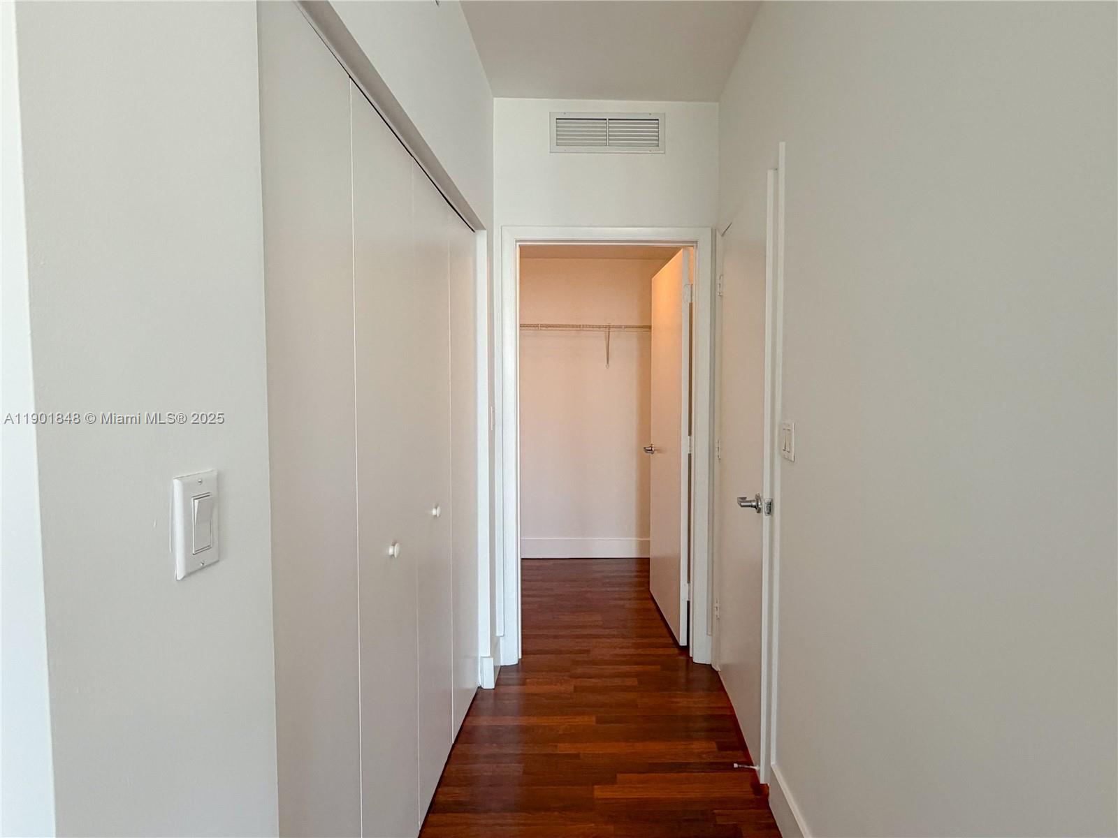 90 Southwest 3rd Street, Unit 2401 Miami, FL 33130 - Photo 21 of 68 a view of a hallway with the wooden floor