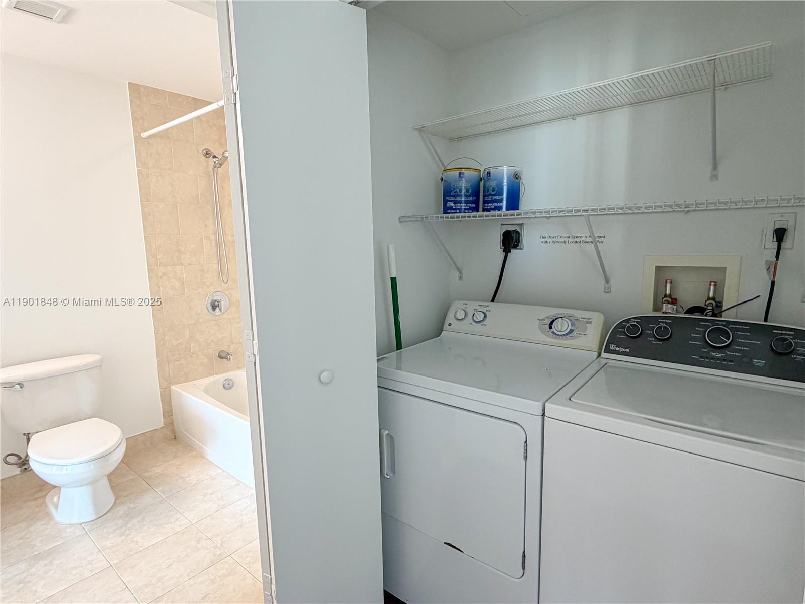 90 Southwest 3rd Street, Unit 2401 Miami, FL 33130 - Photo 35 of 68 a view of bathroom with a sink and a toilet