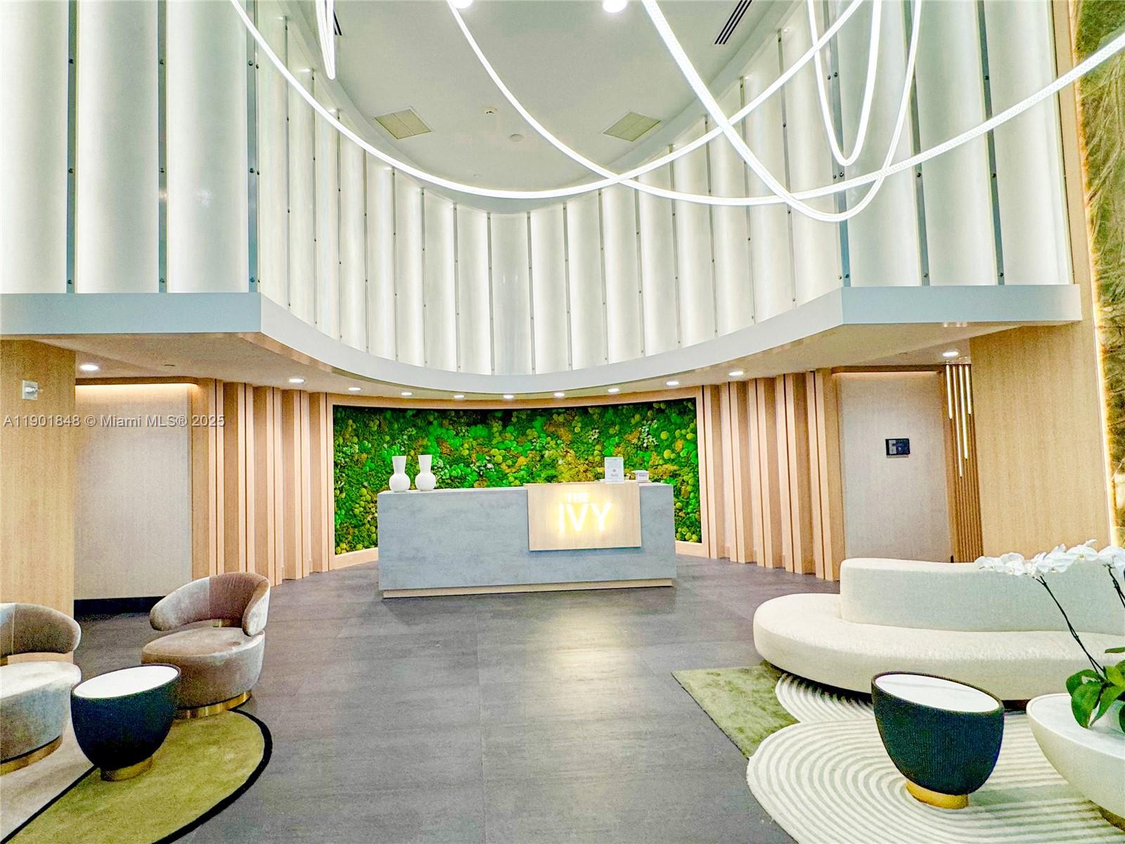 90 Southwest 3rd Street, Unit 2401 Miami, FL 33130 - Photo 5 of 68 a living room with furniture and a wooden floor