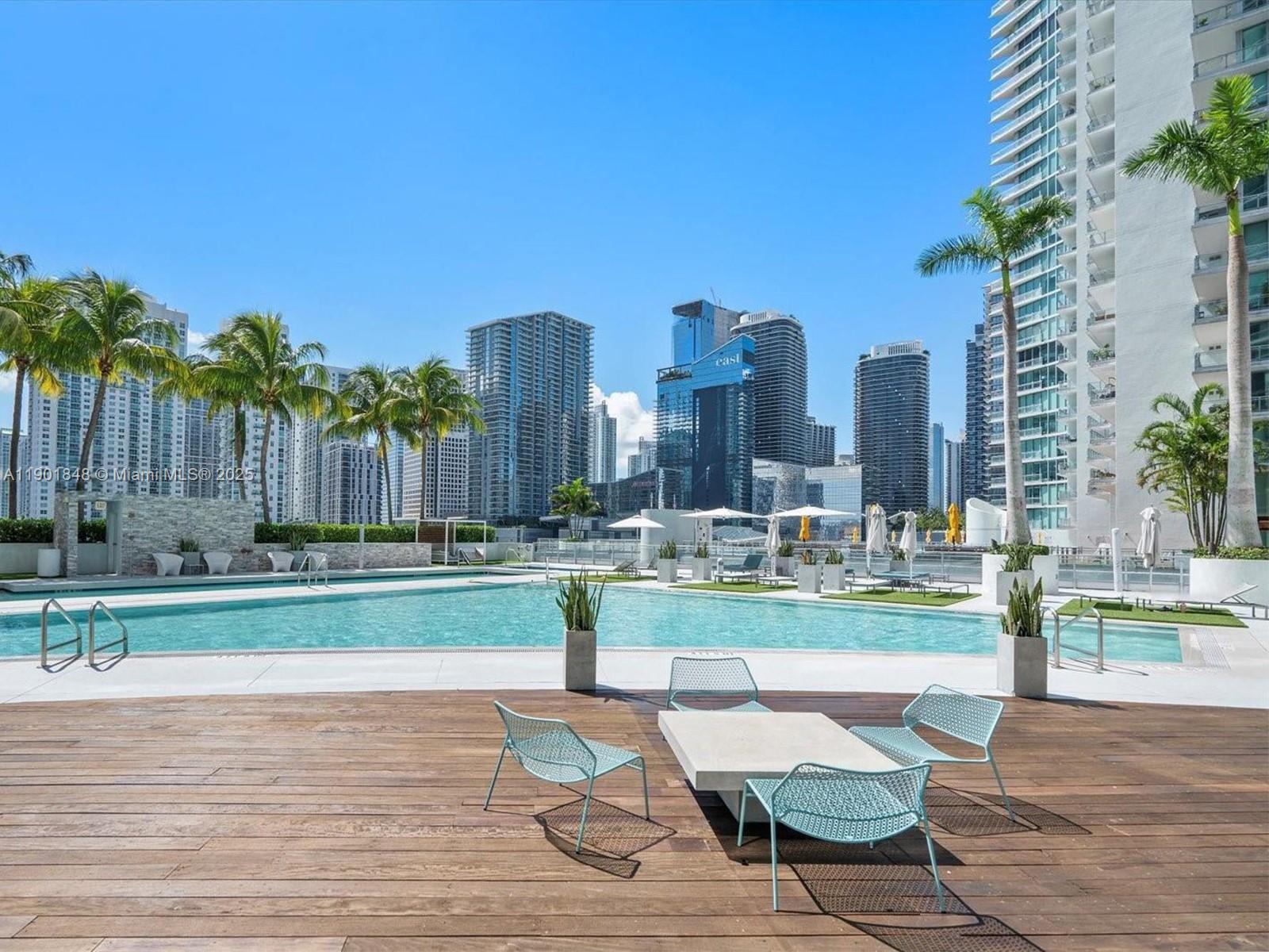 90 Southwest 3rd Street, Unit 2401 Miami, FL 33130 - Photo 54 of 68 a view of a city with tall buildings and a yard