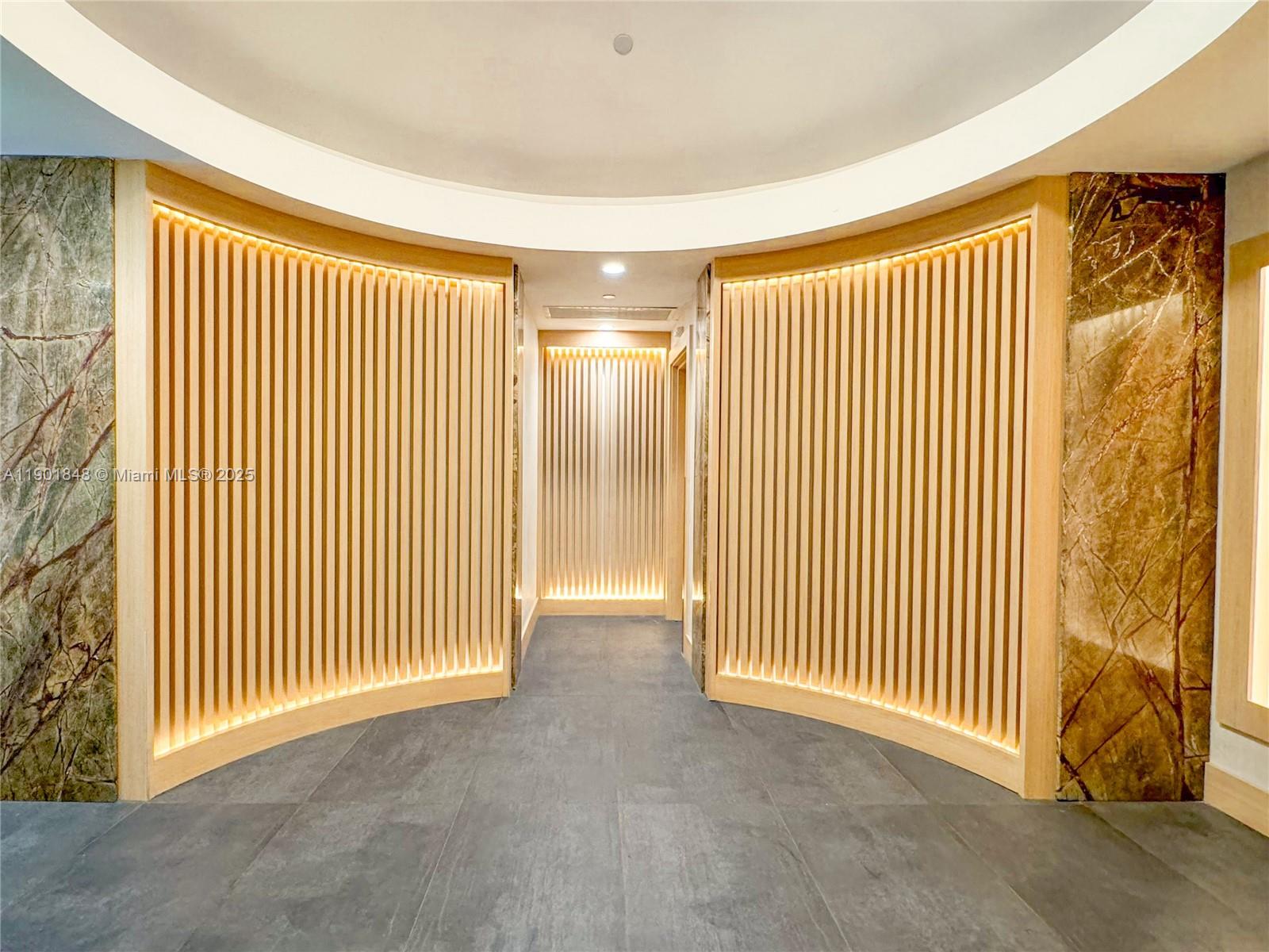 90 Southwest 3rd Street, Unit 2401 Miami, FL 33130 - Photo 60 of 68 a view of a room with a wooden floor and a window