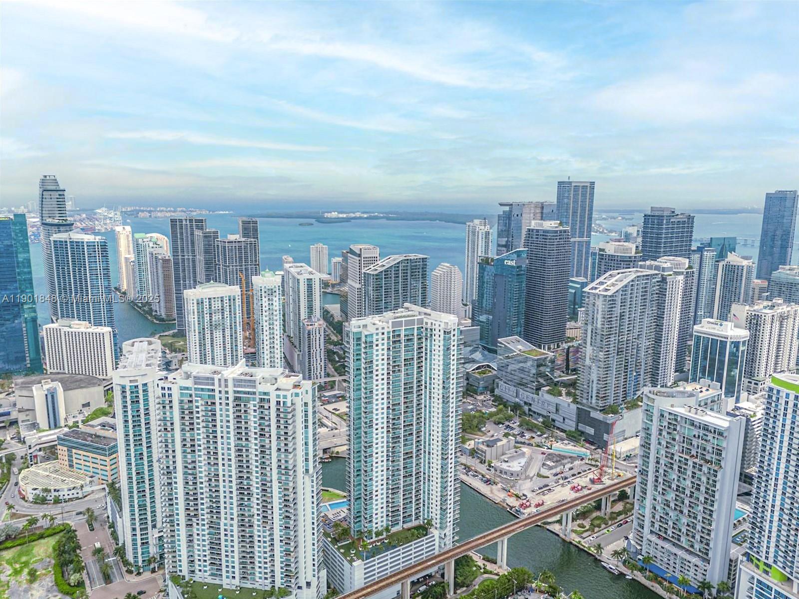 90 Southwest 3rd Street, Unit 2401 Miami, FL 33130 - Photo 66 of 68 a view of a city with tall buildings