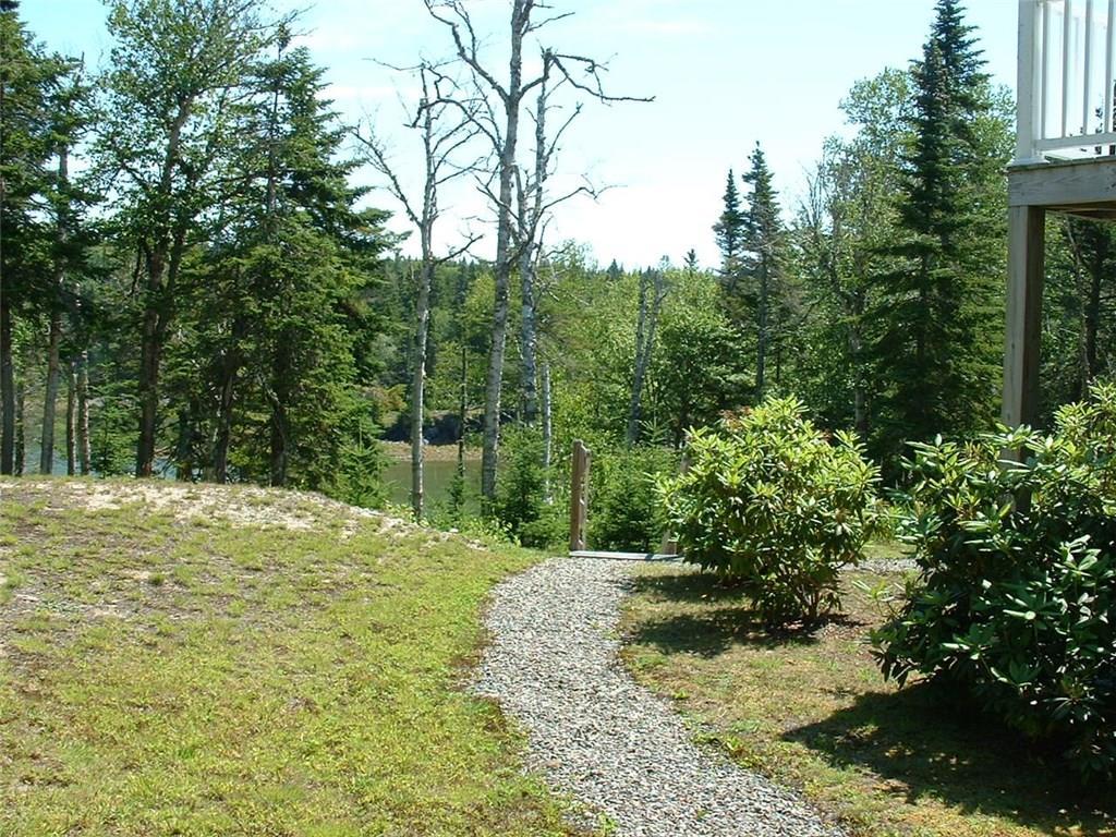 487 Yoho Head Road Machiasport, ME 04655 - Photo 22 of 33 Backyard with steps leading to...