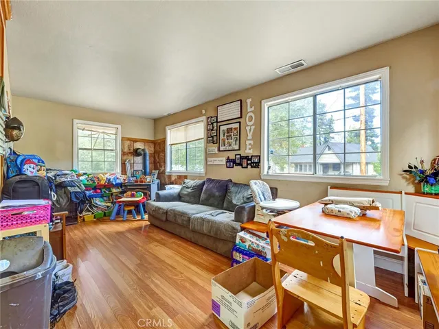a living room with furniture and a table