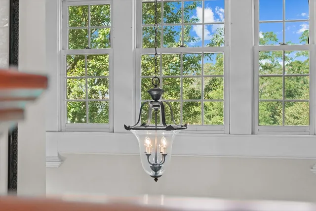 a white bath tub sitting next to a window
