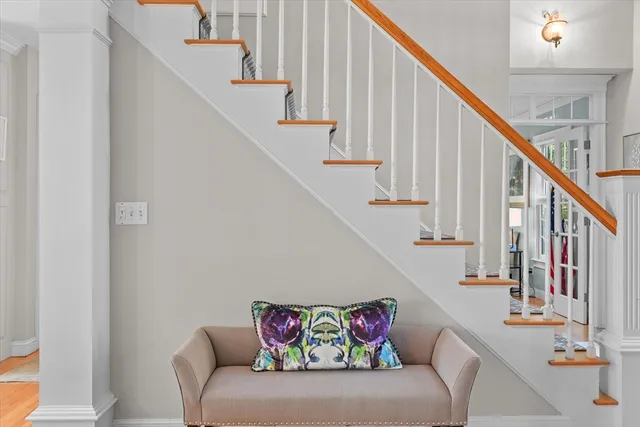 a view of entryway with wooden stairs