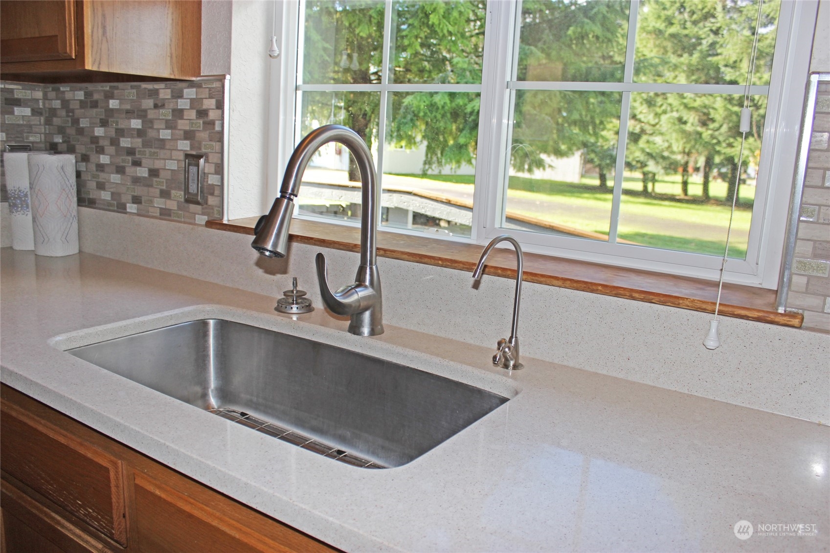 9441 Gastaeson Lane Southwest Rochester, WA 98579 - Photo 18 of 40 a close view of sink and tap