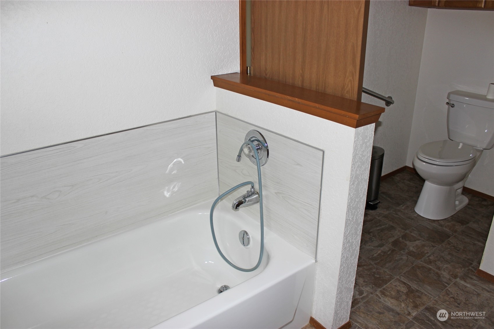 9441 Gastaeson Lane Southwest Rochester, WA 98579 - Photo 23 of 40 a bathroom with a toilet and a shower