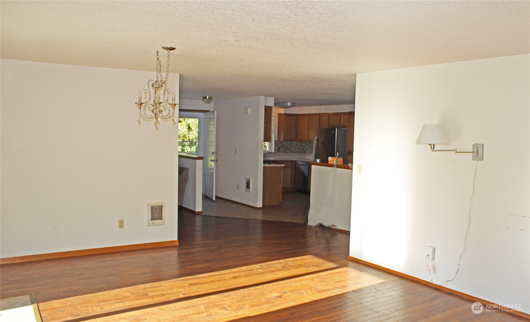 9441 Gastaeson Lane Southwest Rochester, WA 98579 - Photo 27 of 40 a view of a kitchen with a refrigerator