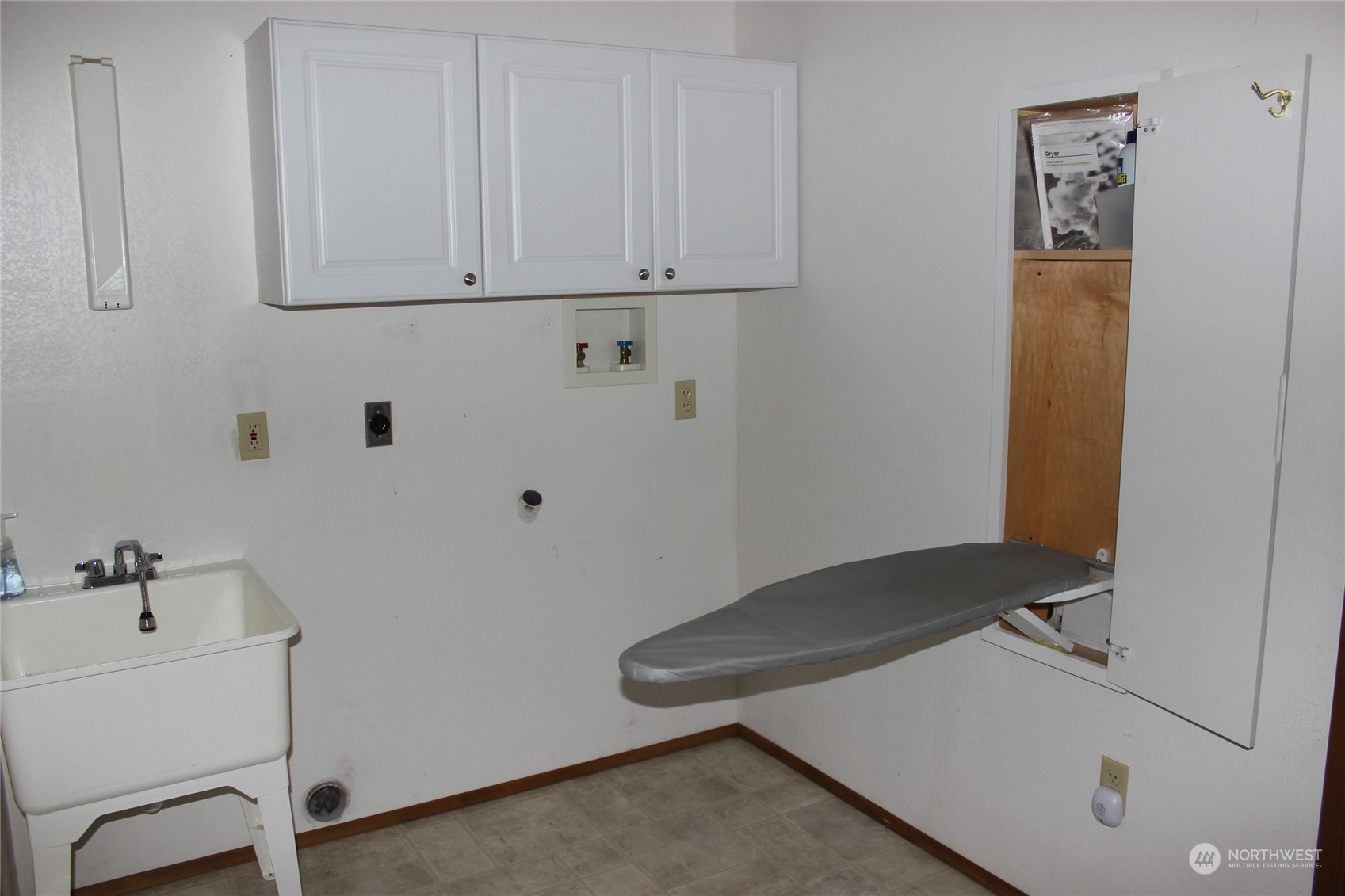 9441 Gastaeson Lane Southwest Rochester, WA 98579 - Photo 29 of 40 a room with storage and utility