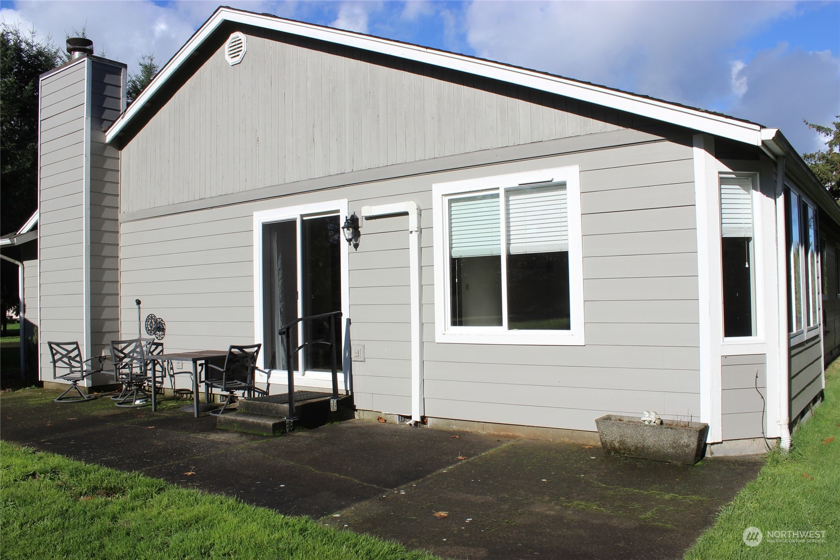 9441 Gastaeson Lane Southwest Rochester, WA 98579 - Photo 6 of 40 a front view of a house with a yard