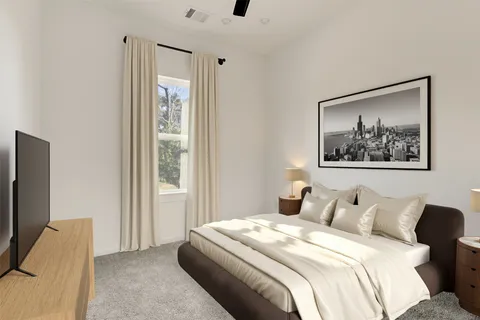 an empty room with a window and a ceiling fan