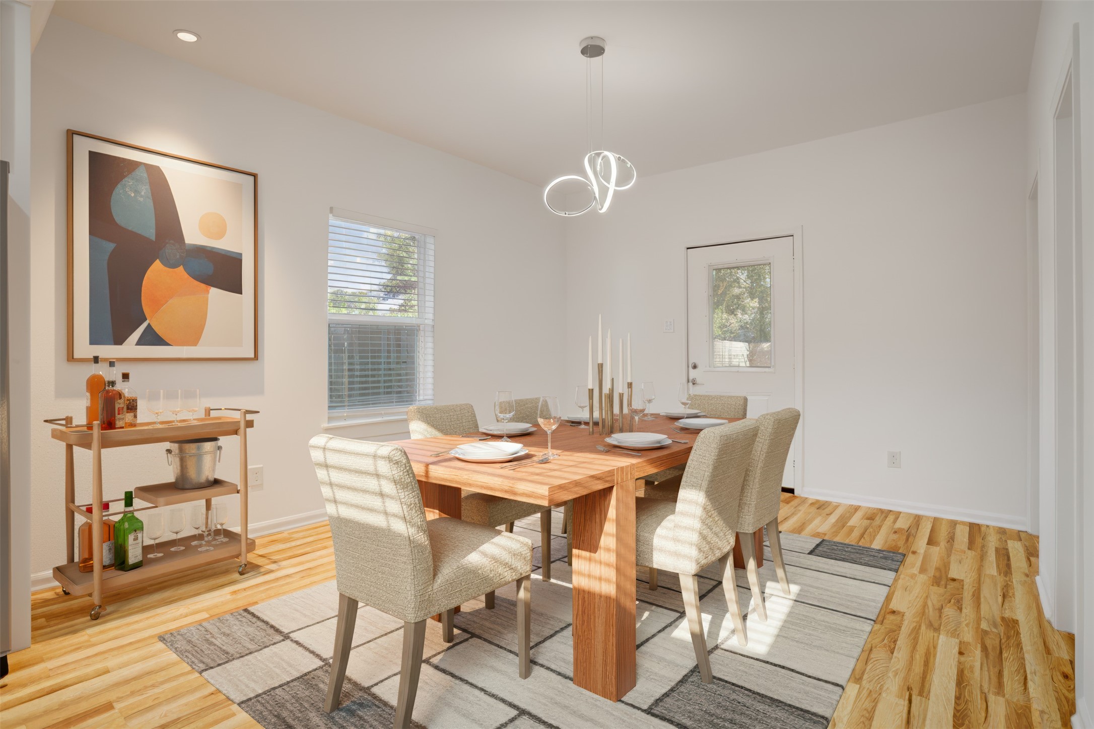 5317 Chennault Road, Unit A / B Houston, TX 77033 - Photo 4 of 27 a view of a dining room with furniture and wooden floor