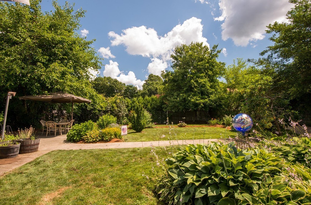 132 Spring Street Stoneham, MA 02180 - Photo 28 of 30 a view of a backyard