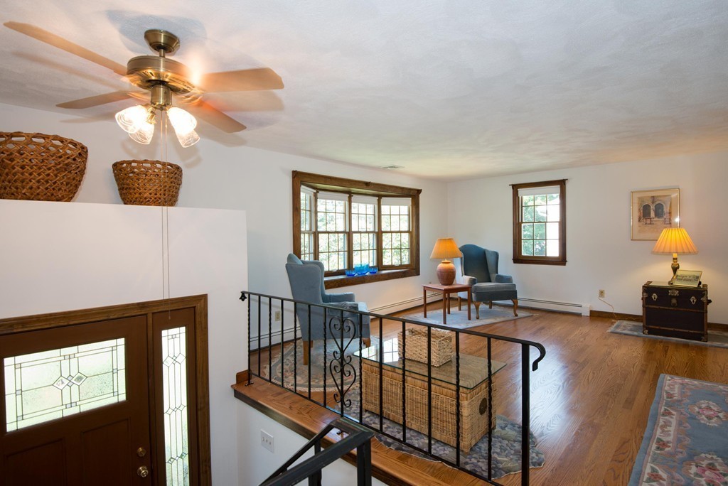 132 Spring Street Stoneham, MA 02180 - Photo 5 of 30 a view of a livingroom with furniture and a window