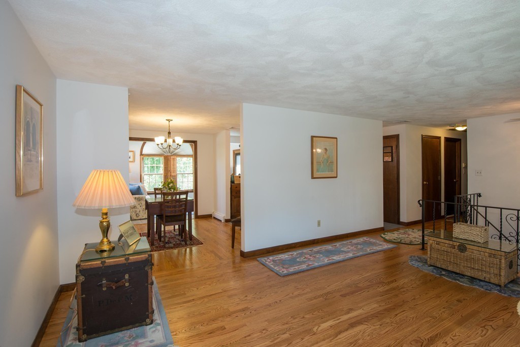 132 Spring Street Stoneham, MA 02180 - Photo 8 of 30 a view of a livingroom with furniture and a window