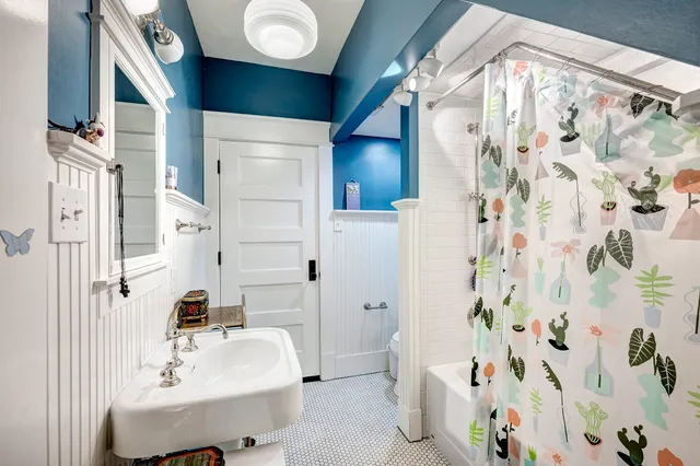 a view of a bedroom with closet and cabinet