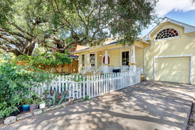 a house view with a garden space