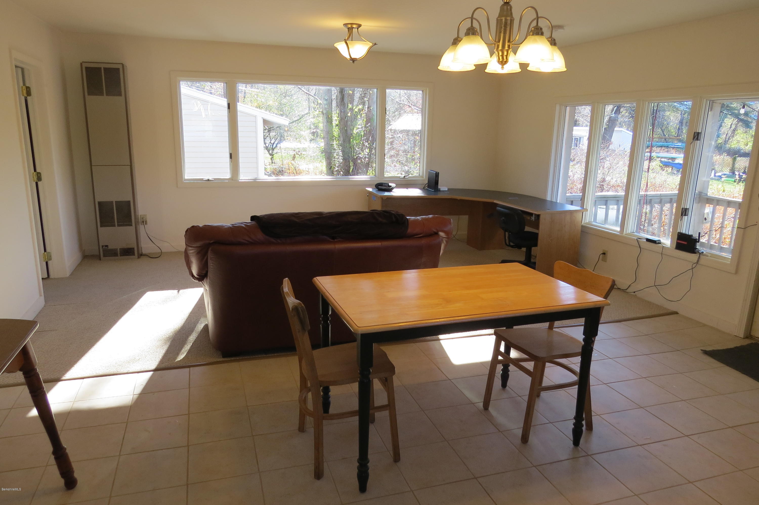 1601 Barber Pond Road Pownal, VT 05261 - Photo 12 of 34 a view of a dining room with furniture and window
