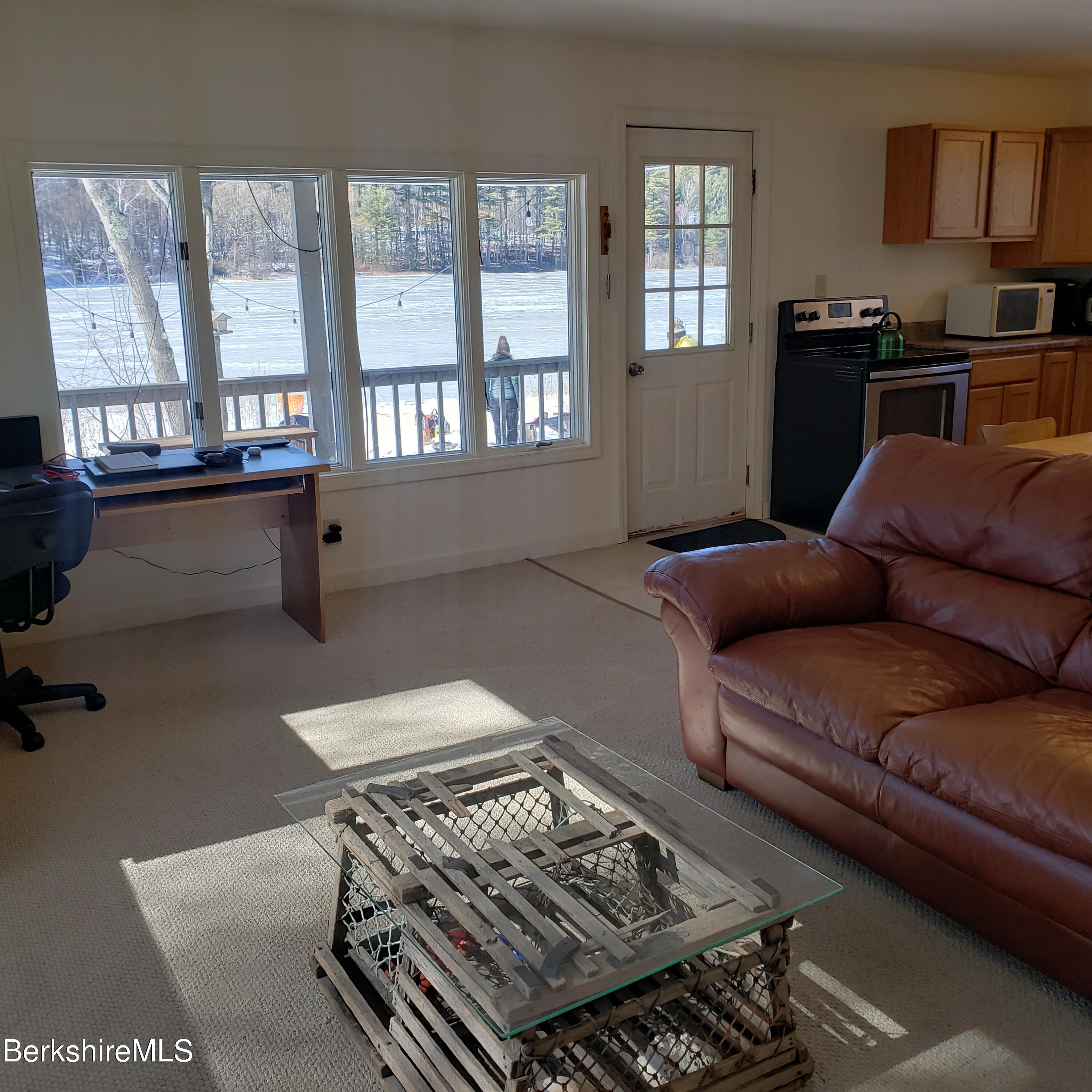 1601 Barber Pond Road Pownal, VT 05261 - Photo 14 of 34 a living room with furniture and a window