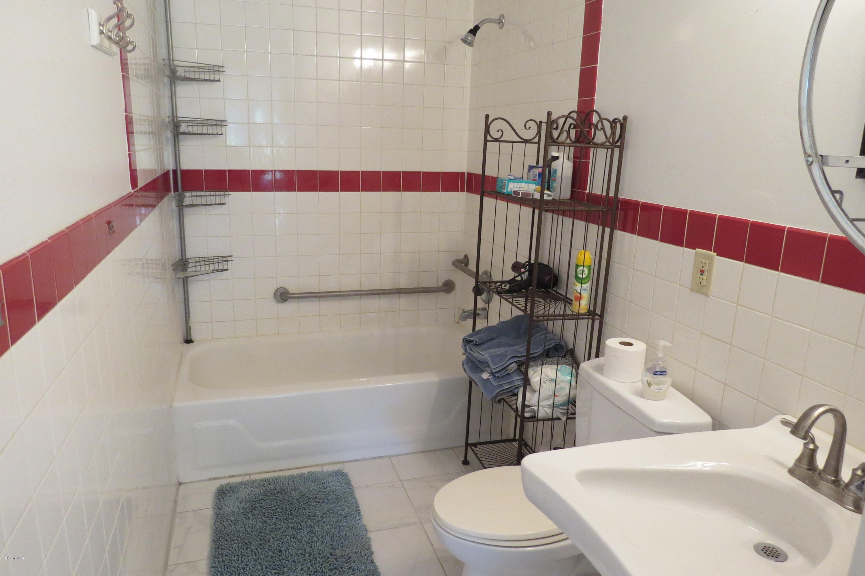 1601 Barber Pond Road Pownal, VT 05261 - Photo 21 of 34 a bathroom with a sink and a bathtub