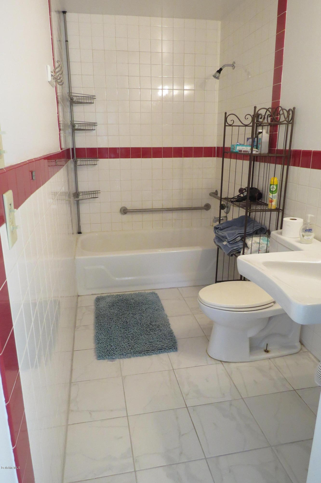 1601 Barber Pond Road Pownal, VT 05261 - Photo 22 of 34 a bathroom with a toilet and a sink