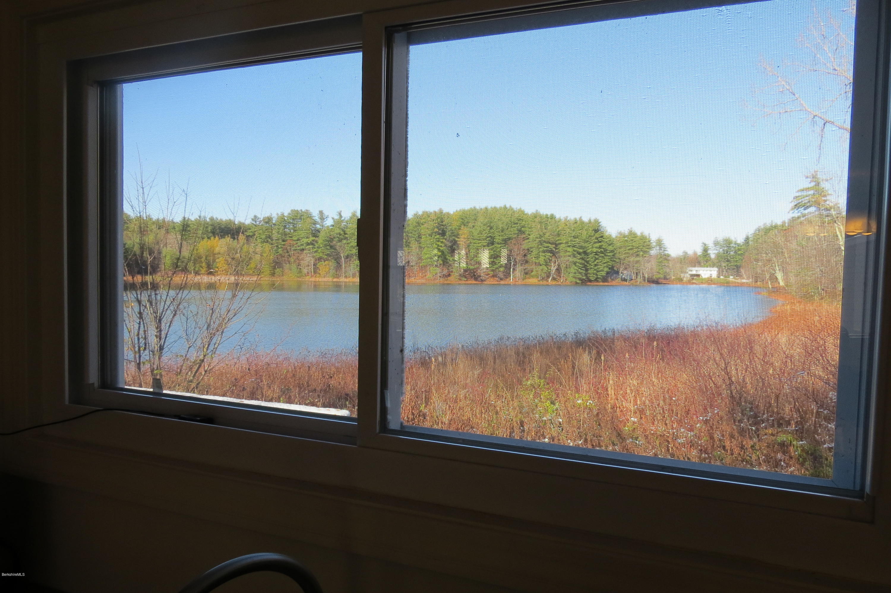 1601 Barber Pond Road Pownal, VT 05261 - Photo 24 of 34 a view of a lake from a window
