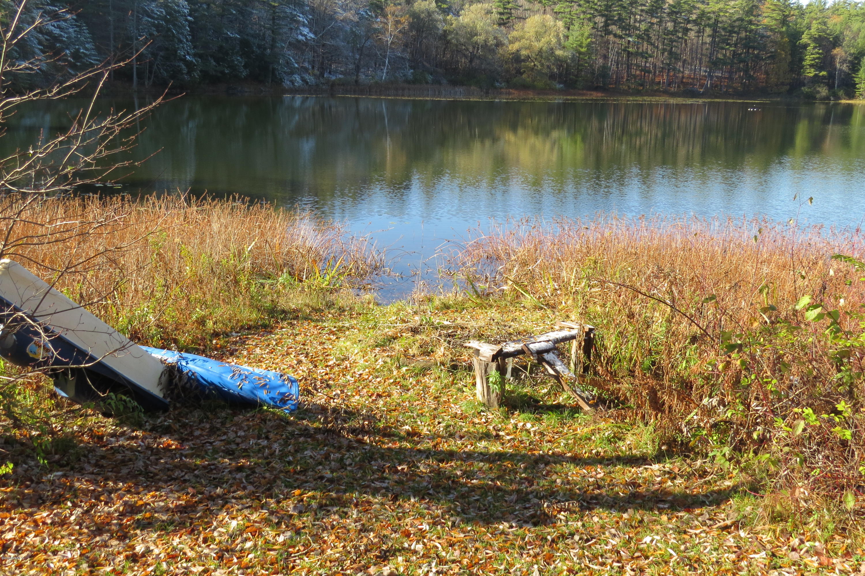 1601 Barber Pond Road Pownal, VT 05261 - Photo 25 of 34 a view of a lake with a mountain view