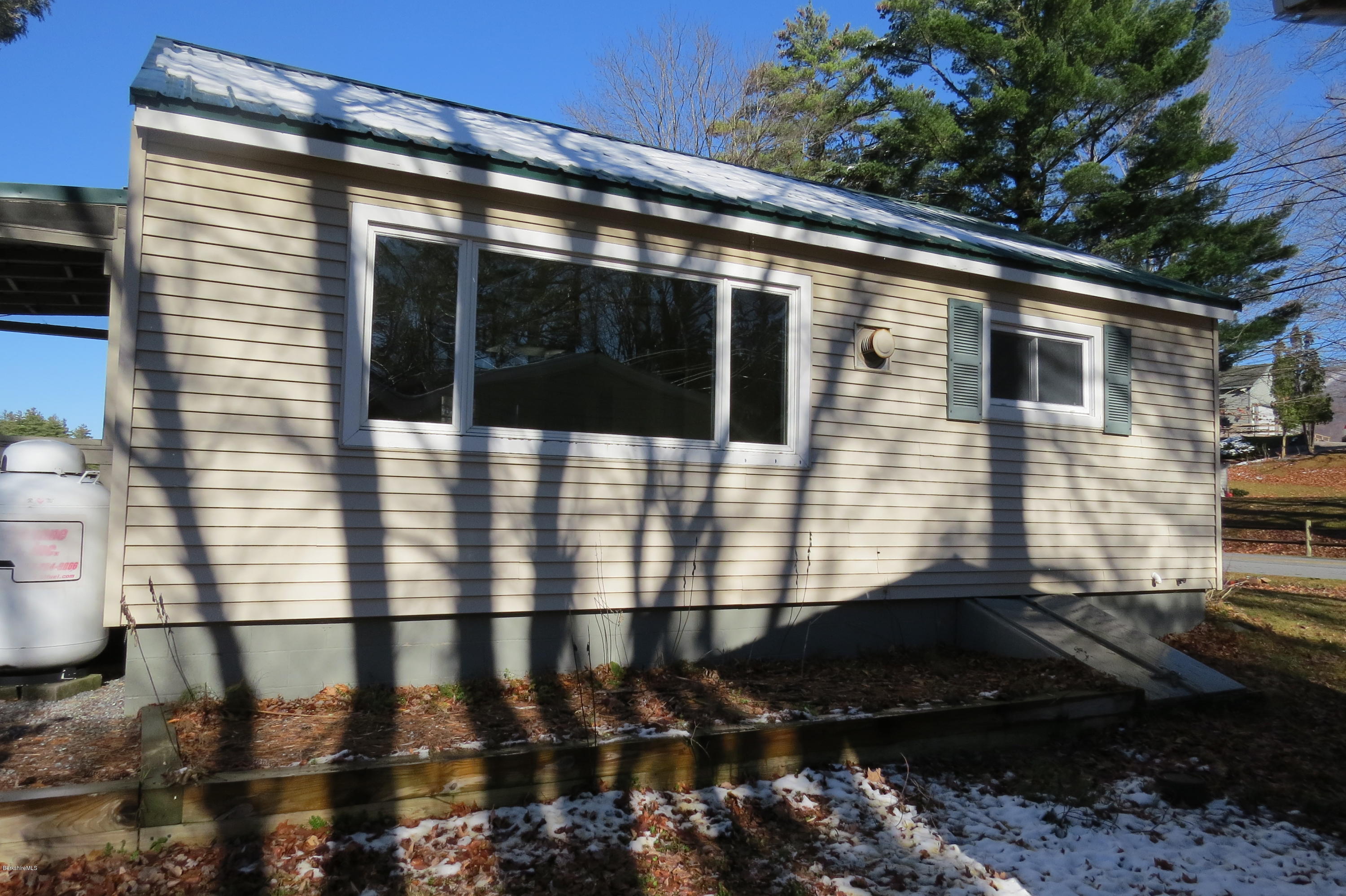 1601 Barber Pond Road Pownal, VT 05261 - Photo 29 of 34 a view of a house with a yard