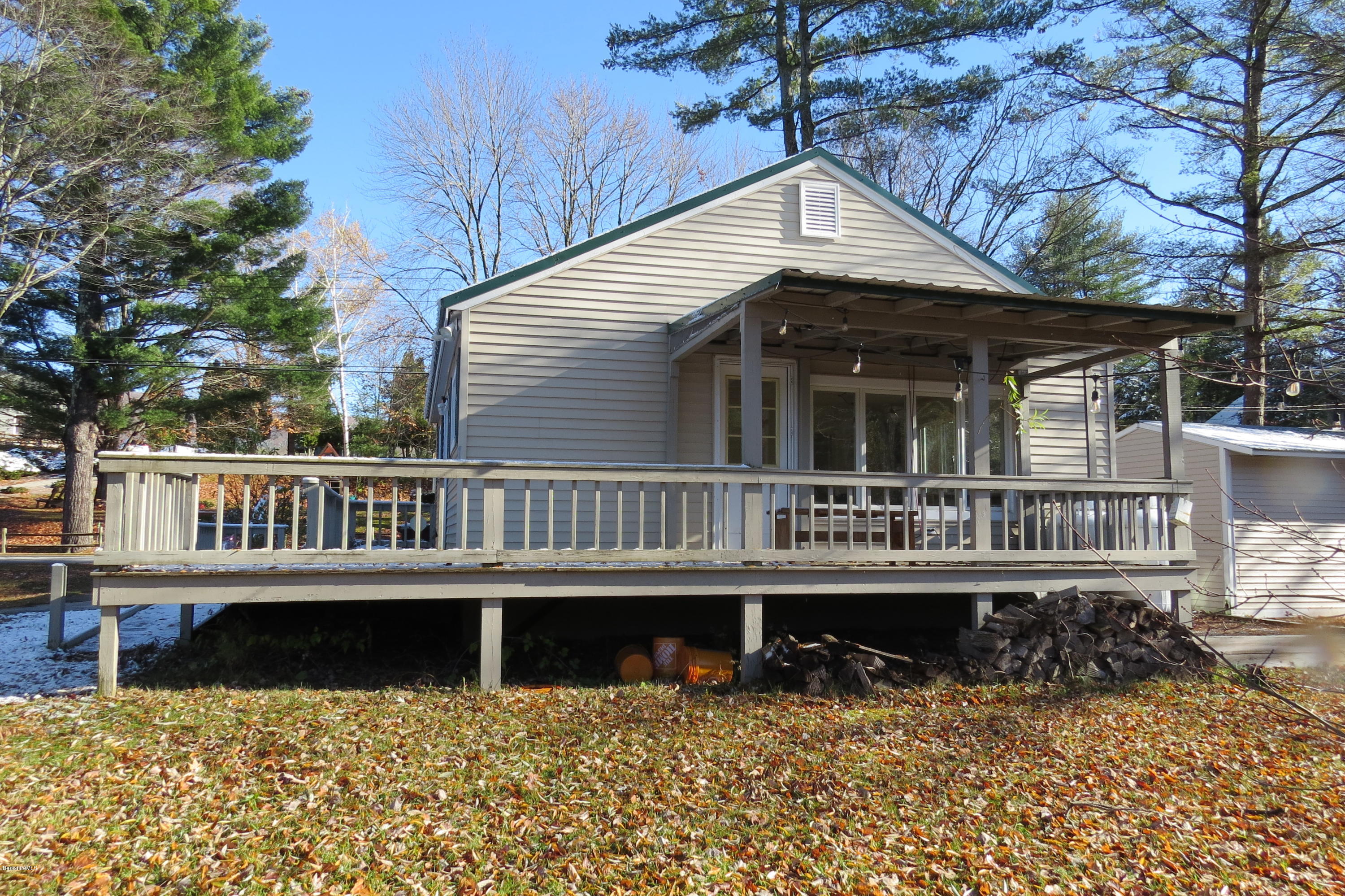 1601 Barber Pond Road Pownal, VT 05261 - Photo 5 of 34 front view of a house with a small deck