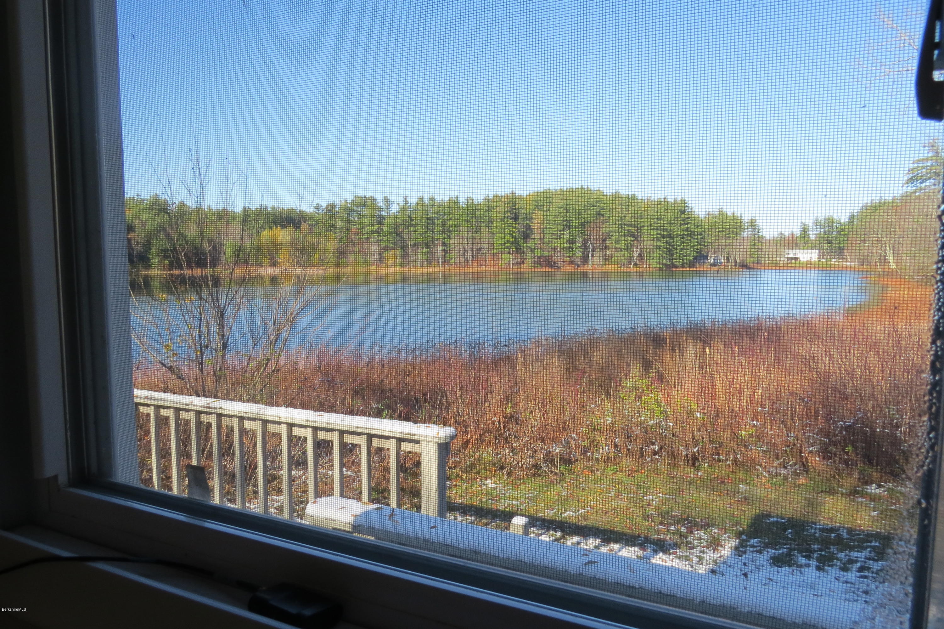 1601 Barber Pond Road Pownal, VT 05261 - Photo 7 of 34 a view of a lake from a balcony