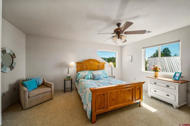 a bathroom with a sink mirror vanity and bathtub