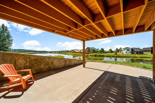 a view of a balcony with furniture