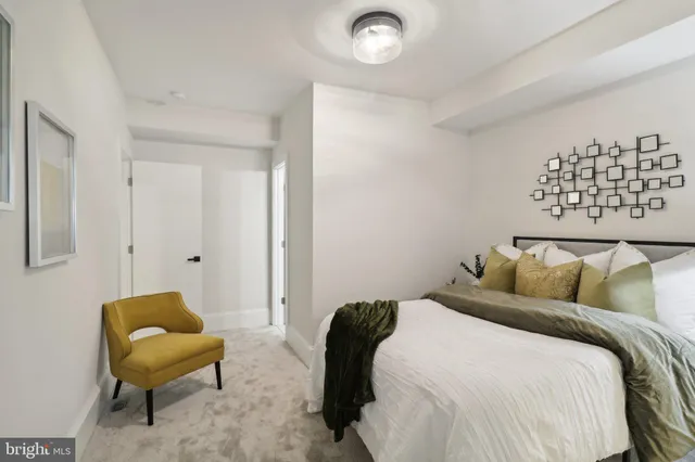 a table and a vase of flowers sitting on a table