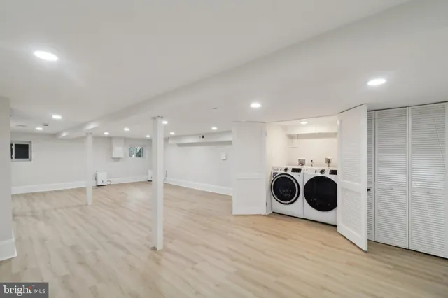 a view of a storage & utility room with wooden floor