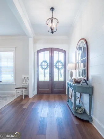 a view of livingroom with furniture window and wooden floor