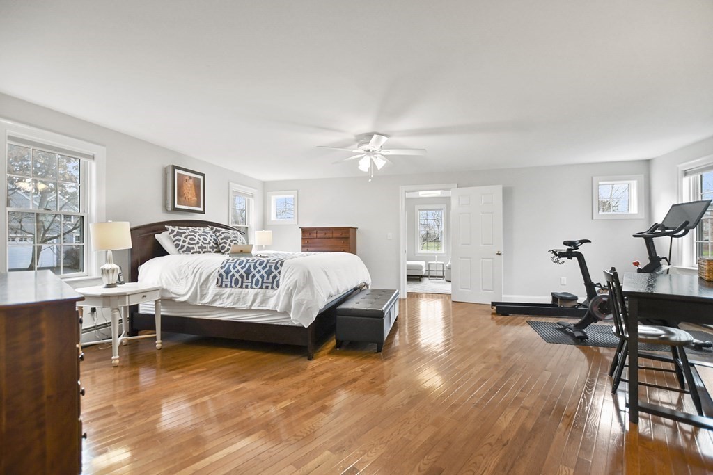 348 Webster Street Needham, MA 02494 - Photo 21 of 42 a bedroom with a bed and wooden floor